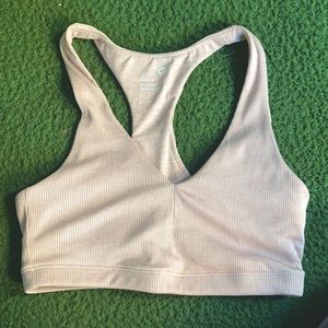 Light pink ribbed (brushed tech jersey) sports bra